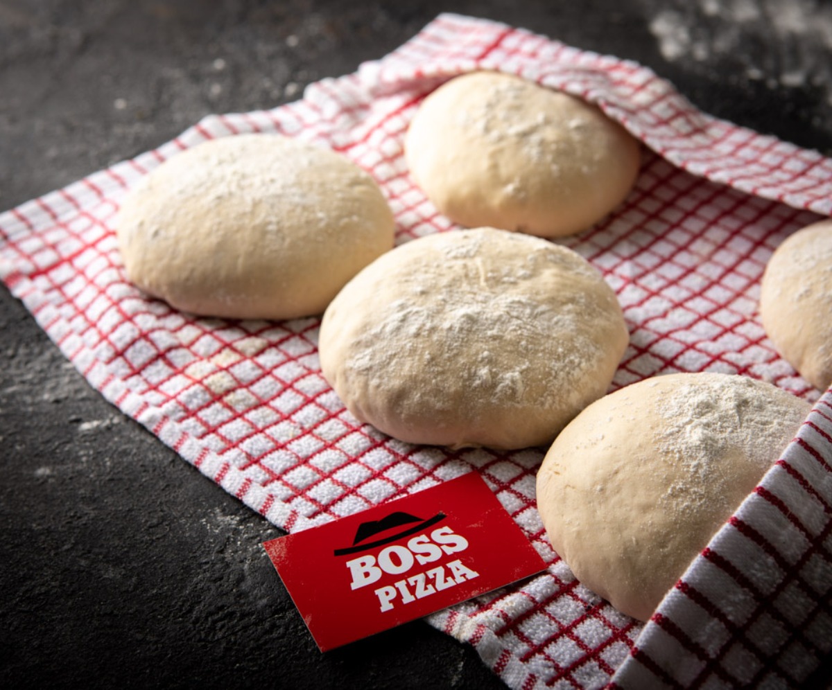 Boss Pizza Freshly made dough Fresh dough for pizza in a towel