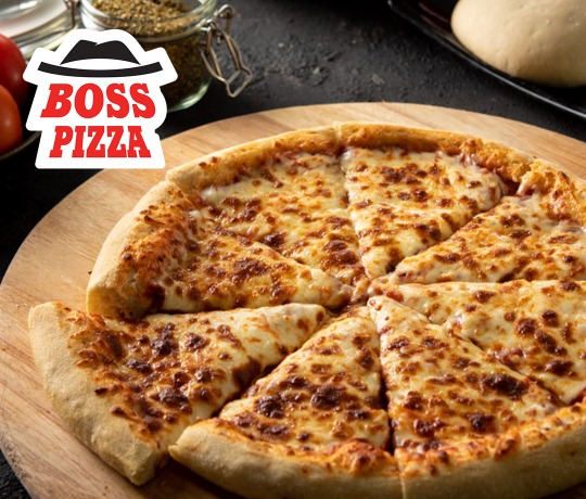 Boss Pizza Margherita Boss Pizza Margherita on a wooden chopping board surronded by ingredients and boss pizza logo